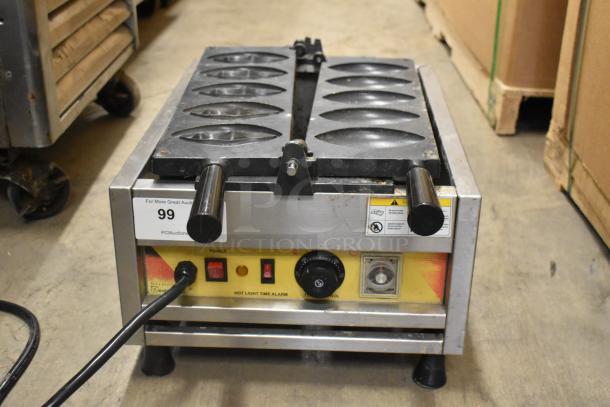 NP-257 Stainless Steel Commercial Countertop Waffle Maker, 110V, 1 Phase, features dual handles and control panel, good condition.