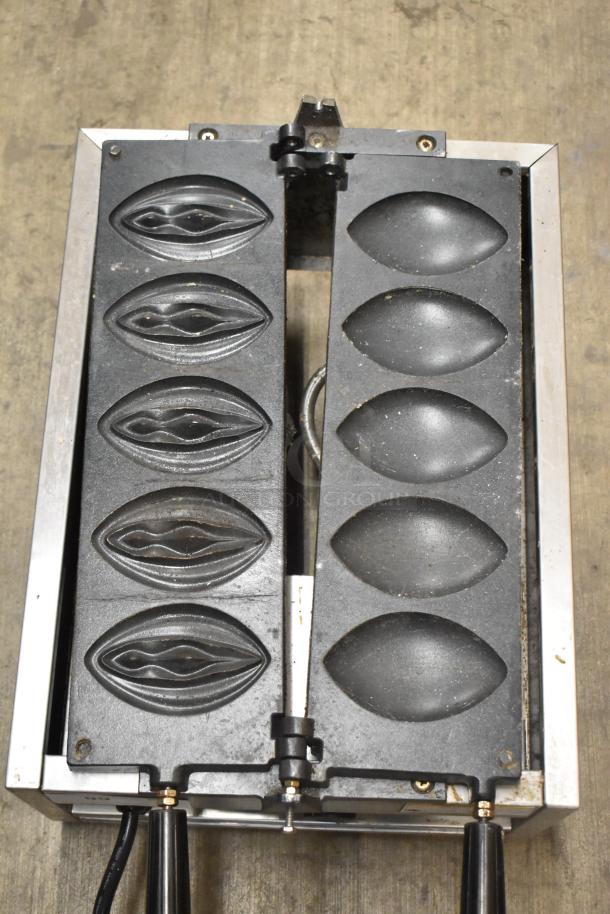 NP-257 stainless steel commercial countertop waffle maker, 110V, 1 phase. Features dual molds, used condition. Model: NP-257.