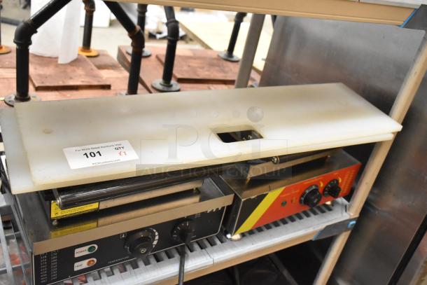 White cutting board for Subway make line, rectangular, with cutout handle, marked "101 x2" for auction quantity.
