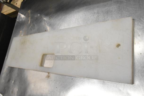 White cutting board for Subway make line, rectangular, with hole and slot; used condition, visible scratches.
