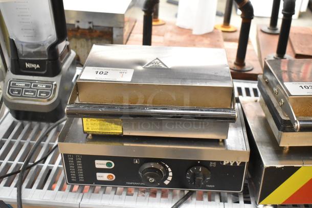 PYY PYYHFLFY-233SRUS stainless steel commercial waffle maker, 110-120V, 1 phase, with temperature and timer controls, in used condition.