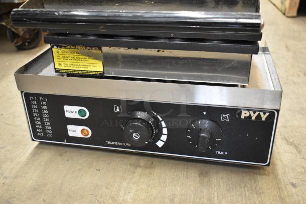 PYY PYYHFLFY-233SRUS stainless steel commercial waffle maker, 110-120V, with temperature and timer controls. Good condition.