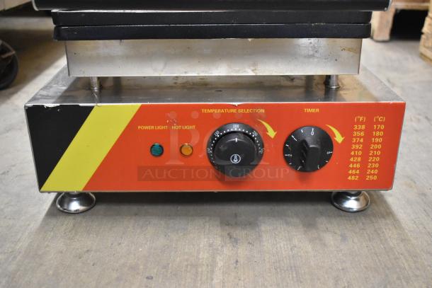 Stainless steel NP-520 commercial waffle maker, countertop model, with temperature and timer controls, 110 volts, 1 phase.