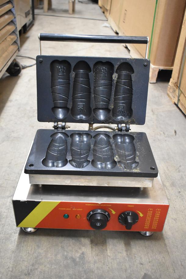 NP-520 stainless steel commercial waffle maker, 110V, features fish-shaped molds, temperature control, and timer. Good condition.