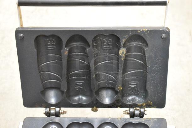 NP-520 stainless steel commercial waffle maker with unique mold design, 110 volts, 1 phase. Visible wear.