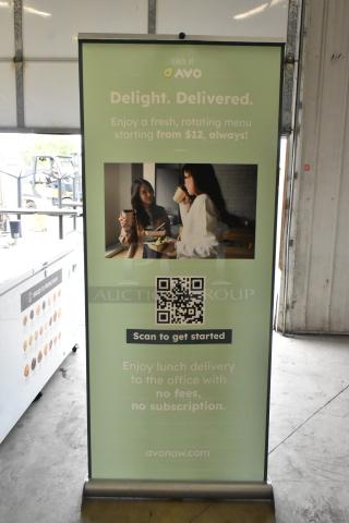 Roll-up sign for "Lunch by Avo" featuring delivery services, pricing, QR code, and promotional text.