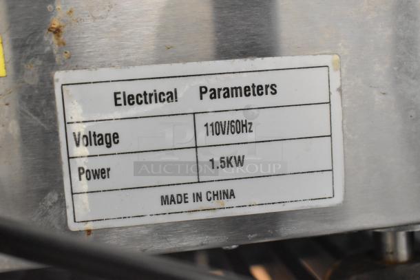 Stainless steel electric griddle label showing 110V/60Hz, 1.5KW power, made in China.