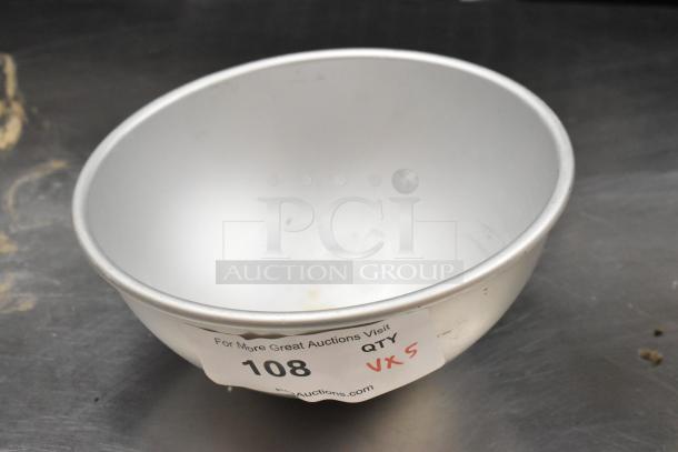 Set of 5 metal kitchen items including a round baking pan and bowl, featuring a 35-cup muffin pan. Good condition. Quantity tag indicates QTY 5.