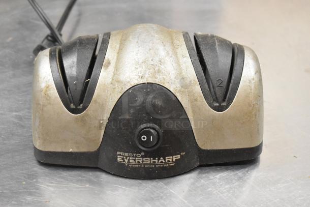Presto EverSharp electric knife sharpener in used condition, dual sharpening slots, labeled "Presto Eversharp."