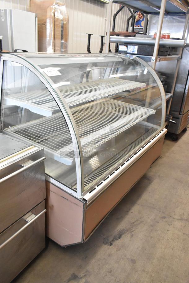 Turbo Air TB-5R refrigerated bakery case with curved glass, commercial floor model on casters, 115V, metal finish.