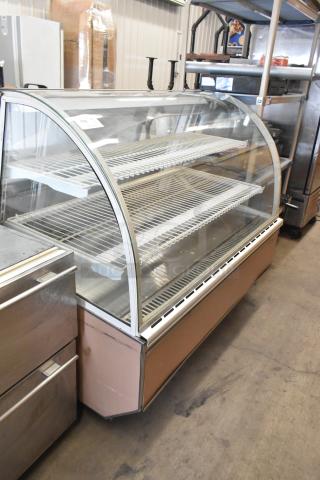 Turbo Air TB-5R refrigerated bakery case with curved glass, commercial floor model on casters, 115V, metal finish.