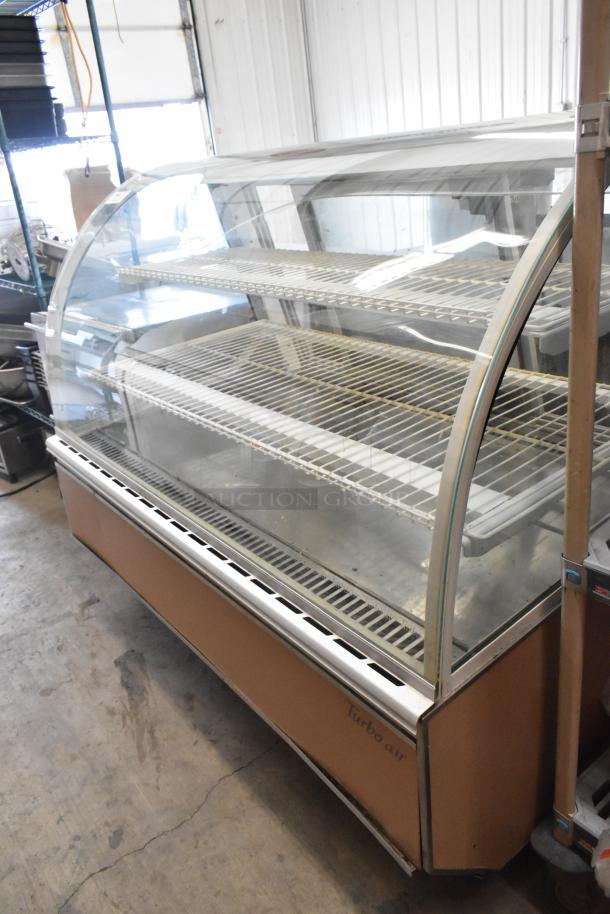 Turbo Air TB-5R refrigerated bakery case, curved glass, on commercial casters, 115V, 1 Phase, good condition.