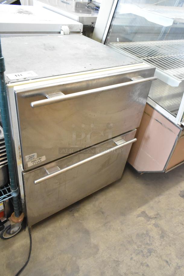 Sub-zero 700BR-3 stainless steel 2 drawer cooler/freezer. Used condition, 115 volts, 1 phase. Tags showing model and specs.