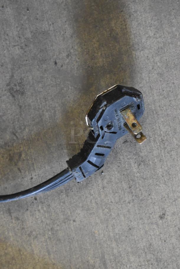 A power plug from the Sub-zero 700BR-3 cooler/freezer, showing signs of wear. 115 volts, 1 phase.