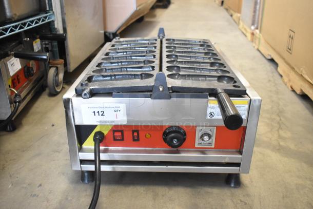 Stainless steel A Piece of Gayke NP-229 commercial waffle maker, 110V, 1 phase, with control panel and identification tag.