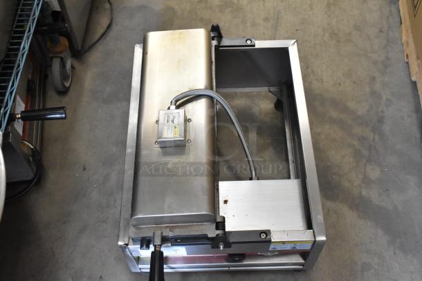 A Piece of Gayke NP-229 stainless steel commercial waffle maker, countertop model, 110 volts, used condition.
