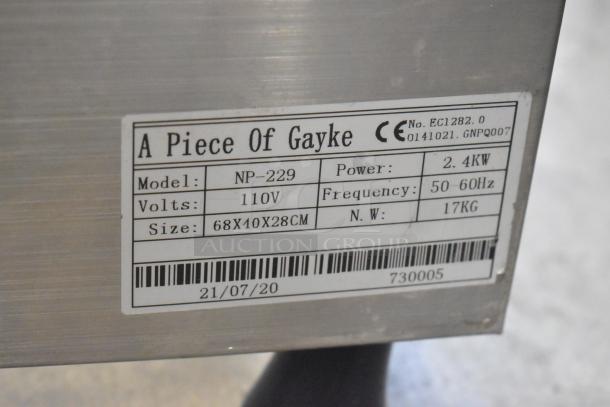 A Piece of Gayke NP-229 stainless steel commercial waffle maker, 110V, 2.4KW power, model label visible.