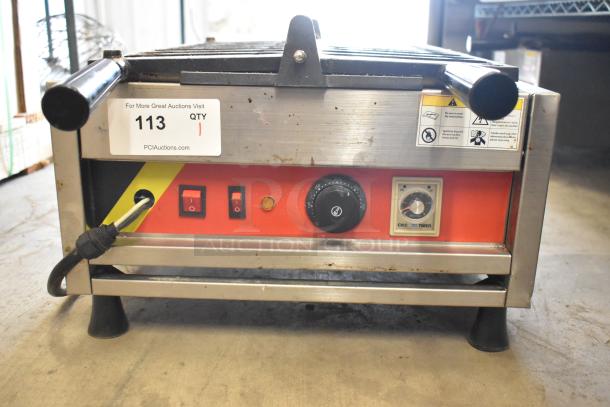 A Piece of Gayke NP-229 stainless steel commercial waffle maker, 110V, 1 phase, with switches, knob, and timer control.