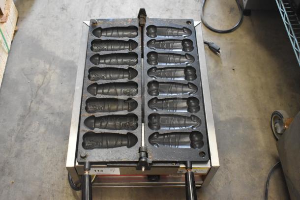 A Piece of Gayke NP-229 stainless steel commercial waffle maker, 110 volts, specialty mold, used condition. Model NP-229.