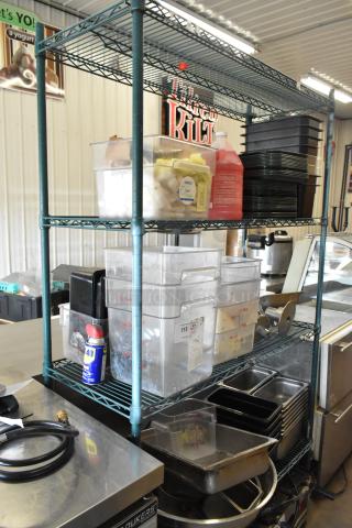 Metro shelf with poly bins, drop-in bins, mixer attachments, stainless steel bins. Tags detail contents; shelving not included.