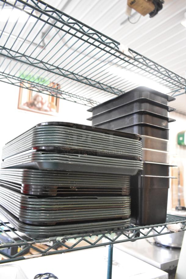 Assorted poly and stainless steel drop-in bins, mixer attachments; condition varies, shelving not included.