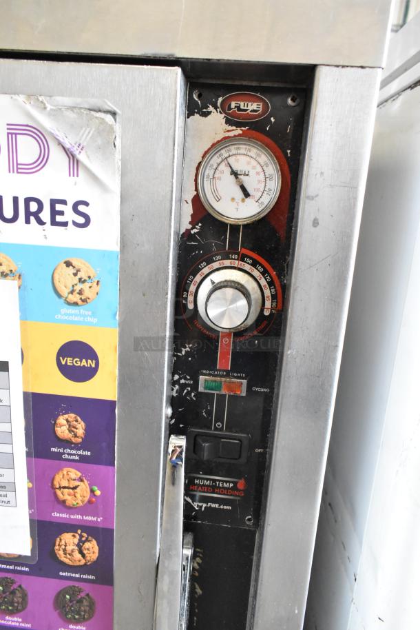 FWE TS-1826-7UC stainless steel heated holding cabinet with controls and temperature gauge, on commercial casters, 115V.