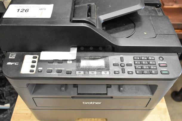 Brother MFC-L2710DW Copier Scanner Printer on countertop. Features control panel, document feeder, and visible auction tag #126.
