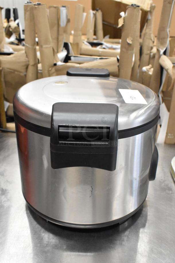 Aroma ARC-1130S stainless steel rice cooker, used, with visible surface scratches. Black handles, 120 volts, 1 phase.