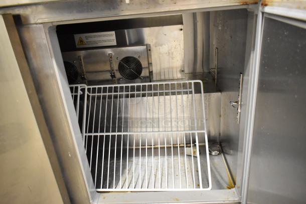 2024 Vevor KTR-48B1 stainless steel 2-door undercounter cooler, commercial casters, stainless interior, used condition.