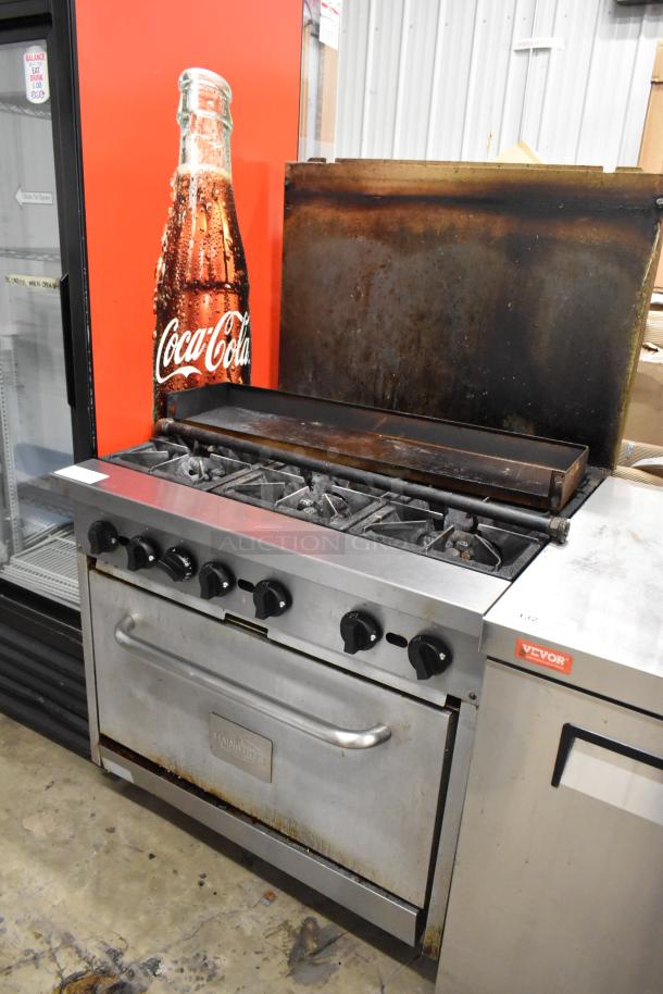 Mainstreet stainless steel commercial gas 6-burner range with oven, over shelf, and backsplash. Used condition.