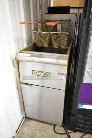 Motak MGF3-N-C stainless steel gas fryer with 2 metal baskets, 90,000 BTU. Slight wear visible.