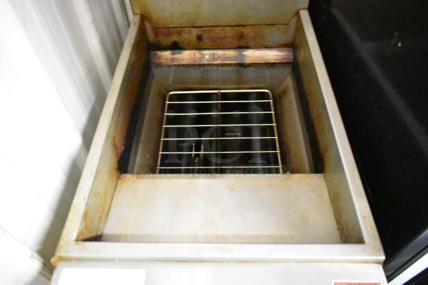Motak MGF3-N-C stainless steel commercial deep fryer, 90,000 BTU, with 2 metal fry baskets; visible signs of use.