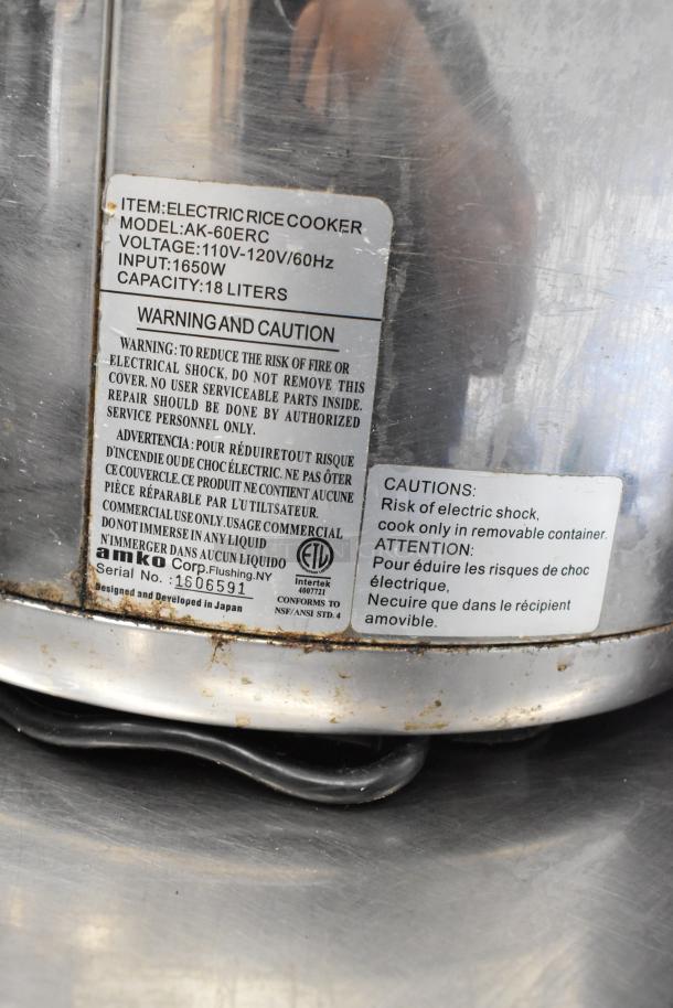 Amko AK-60ERC stainless steel rice cooker, 120 volts, 1 phase. Visible label with model details and caution warnings.