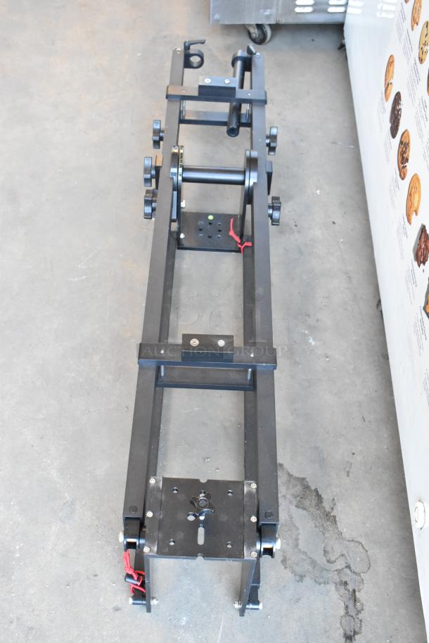 2 Pocket Jib Pro by Cinevate, black, in good condition, with adjustable mounting, red cable ties visible, includes bags.