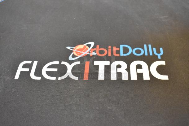 4 black bags labeled "Orbit Dolly FLEXITRAC," each with unknown contents, in good condition, auctioned as 4x your bid.