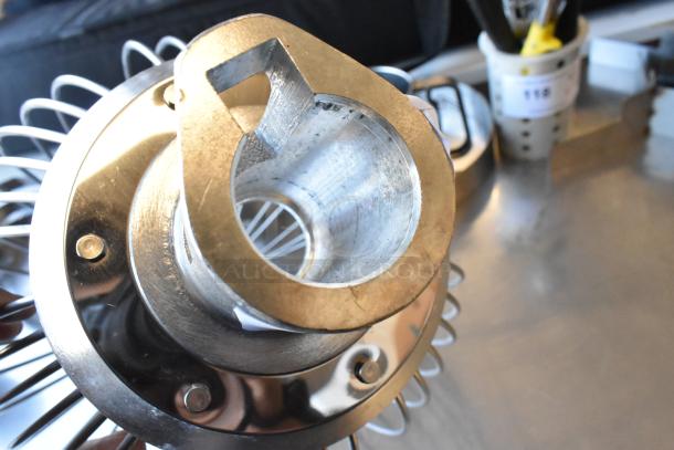 Metal commercial whisk attachment for Hobart mixer, sturdy construction, excellent condition, suitable for heavy-duty use.
