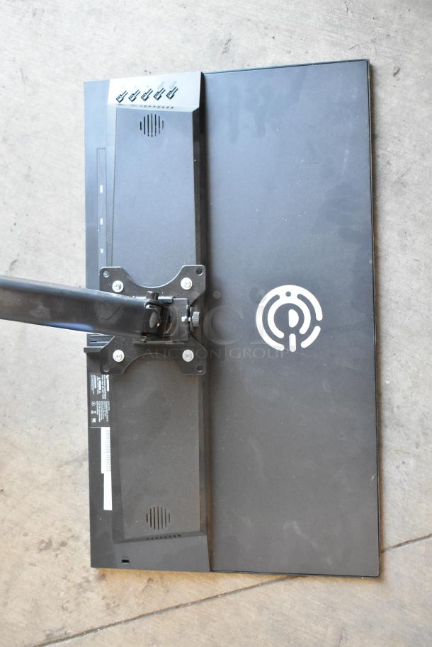 Element EM2FPAB24B monitor with wall mount, black, showing rear design and mounting bracket. Appears in used condition.