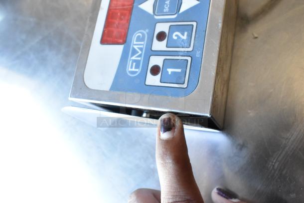 FMP Zap Timer, 115 Volts, 1 Phase in good condition. Features LED display, dual buttons marked "1" and "2".