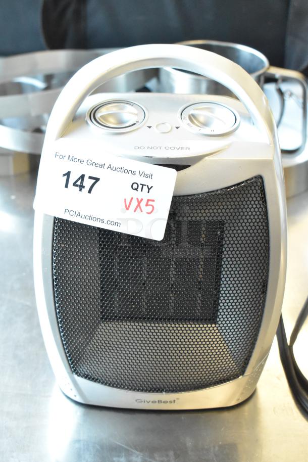 GiveBest PTC-905 heater with visible controls and auction tag, in good condition.