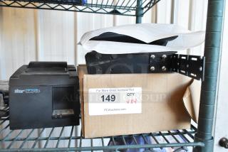 4 items including Star TSP100 receipt printer, Verizon corded telephone, Cradlepoint AER2200; boxed, on metal shelf.
