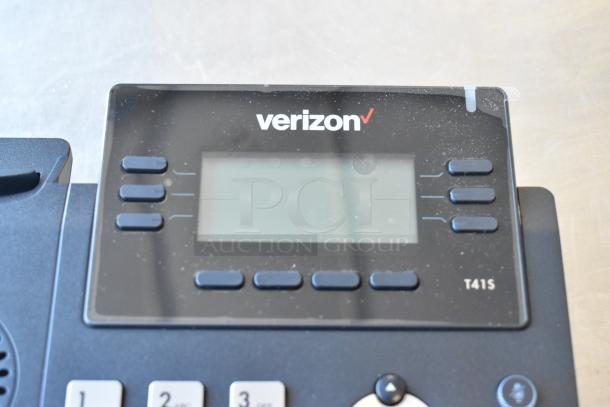 Verizon T41S corded telephone with display and buttons. Good condition, part of a lot with receipt printer and Cradlepoint router.
