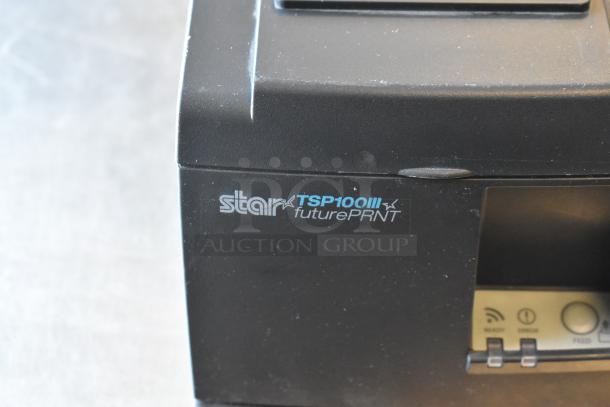 Star TSP100 Receipt Printer, black, model futurePRNT, showing front label and partially visible buttons.