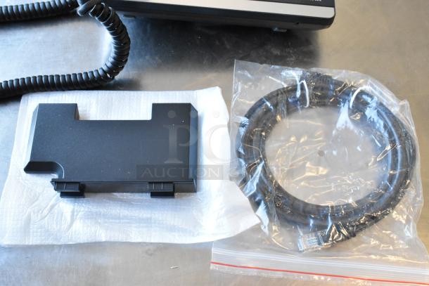 4 items including Star TSP100 receipt printer, Verizon corded phone, Cradlepoint AER2200 port, coiled cord, and Ethernet cable.