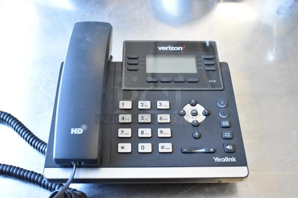 Verizon Yealink T41S corded telephone, black, with LCD screen and numeric keypad, in good condition.