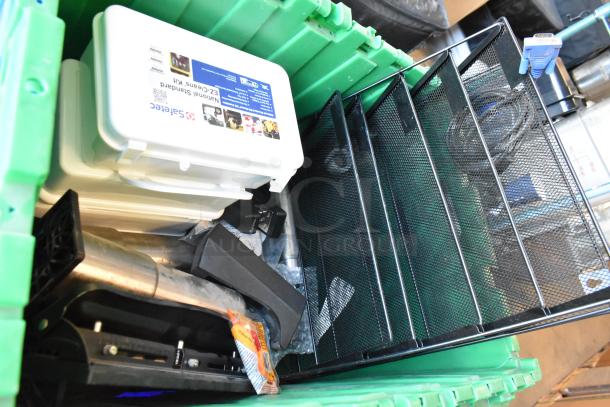 Lot of various items in three green poly bins; includes SafeTec cleaning kit, metal mesh tray, and assorted accessories.
