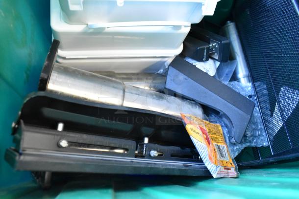 Lot of various items in 3 poly bins, includes metal parts, black mesh organizer, and a stapler, mixed condition.
