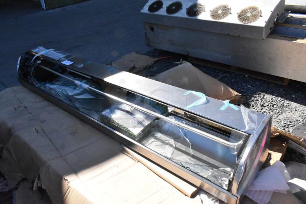 Hoshizaki HNC-210BA-L-SLH sushi display merchandiser, broken glass visible, metal finish, 115 volts, 1 phase.