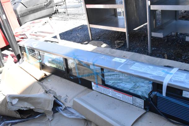 Hoshizaki HNC-210BA-L-SLH sushi display merchandiser with broken glass, 115V, 1 phase, includes visible labels and markings.