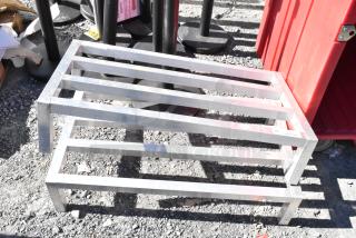 2 Regency 600DUN2036 metal dunnage racks, sturdy slatted design for heavy-duty storage, in good condition.