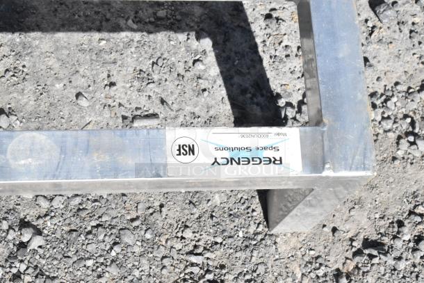 2 Regency 600DUN2036 metal dunnage racks, includes model and NSF labels, durable construction, ideal for storage.